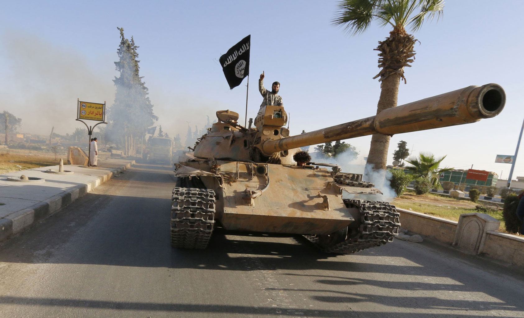 Państwo Islamskie wjeżdża do Raqqa w północnej Syrii. Fot. Reuters/Forum